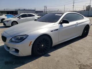 ✅ 2013 BMW 6 Series 650i xDrive • VIN: WBAYM1C51DDZ02396 • Lot: 73494534. Wystawiony na Copart z przebiegiem 115 183 mil. Bezpłatny archiwum sprzedaży aukcyjnych z USA i szczegółowy raport historii pojazdu na DreamBid. Zdjęcie 1.
