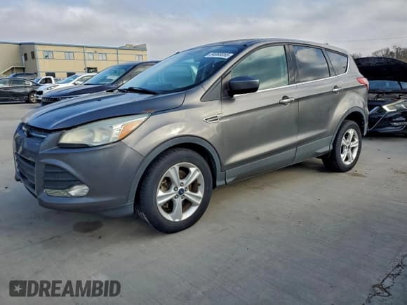 ✅ 2014 Ford Escape SE • VIN: 1FMCU9GX0EUA85846 • Lot: 94998055. Listed on Copart with 97,739 mi. Free auction sales archive from the USA and detailed vehicle history report at DreamBid. Image 1.