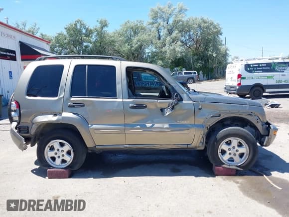 ✅ 2004 Jeep Liberty Limited • VIN: 1J4GL58K14W298712 • Lot: 42642547. Listed on IAAI with 108,514 mi. Free auction sales archive from the USA and detailed vehicle history report at DreamBid. Image 13.