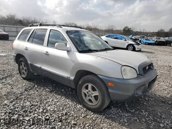 2004 Hyundai Santa Fe GLS z VIN KM8SC13D14U786602, wystawiony jako Copart lot #88913595 z przebiegiem 199 004 mil mil oraz Szkoda całkowita • Salvage title. Historia ofert i sprzedaży dostępna na DreamBid. Obrazek 4.