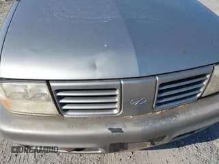 ✅ 2000 Oldsmobile Bravada • VIN: 1GHDT13W3Y2231550 • Lot: 41518286. Listed on IAAI with 313,805 mi. Free auction sales archive from the USA and detailed vehicle history report at DreamBid. Image 6.