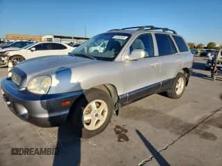 ✅ 2003 Hyundai Santa Fe GLS • VIN: KM8SC13E13U460984 • Lot: 87202585. Wystawiony na Copart z przebiegiem 96 517 mil. Bezpłatny archiwum sprzedaży aukcyjnych z USA i szczegółowy raport historii pojazdu na DreamBid. Zdjęcie 1.