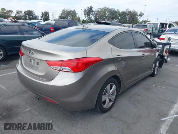 ✅ 2013 Hyundai Elantra GLS • VIN: 5NPDH4AE7DH384654 • Lot: 42754948. Listed on IAAI with 146,218 mi. Free auction sales archive from the USA and detailed vehicle history report at DreamBid. Image 4.