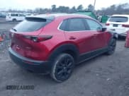 ✅ 2023 Mazda CX-30 Premium • VIN: 3MVDMBDY3PM564362 • Lot: 43703597. Listed on IAAI with 13,954 mi. Free auction sales archive from the USA and detailed vehicle history report at DreamBid. Image 4.