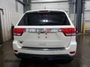 ✅ 2012 Jeep Grand Cherokee Overland • VIN: 1C4RJFCG7CC324310 • Lot: 84262345. Listed on Copart with 155,354 mi. Free auction sales archive from the USA and detailed vehicle history report at DreamBid. Image 6.