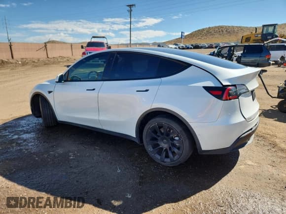 ✅ 2021 Tesla Model Y Long Range • VIN: 5YJYGDEE7MF060729 • Lot: 80831605. Listed on Copart with 65,923 mi. Free auction sales archive from the USA and detailed vehicle history report at DreamBid. Image 2.