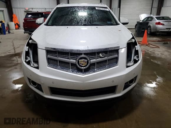 ✅ 2012 Cadillac SRX Luxury Collection • VIN: 3GYFNDE39CS524048 • Lot: 90879385. Wystawiony na Copart z przebiegiem 126 727 mil. Bezpłatny archiwum sprzedaży aukcyjnych z USA i szczegółowy raport historii pojazdu na DreamBid. Zdjęcie 5.