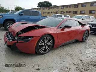 ✅ 2017 BMW i8 • VIN: WBY2Z2C56HV676404 • Лот: 71388045. Опубликован ранее на Copart с пробегом 50 076 миль. Бесплатный доступ к архиву аукционных продаж из США и подробный отчёт об истории автомобиля на DreamBid. Изображение 1.