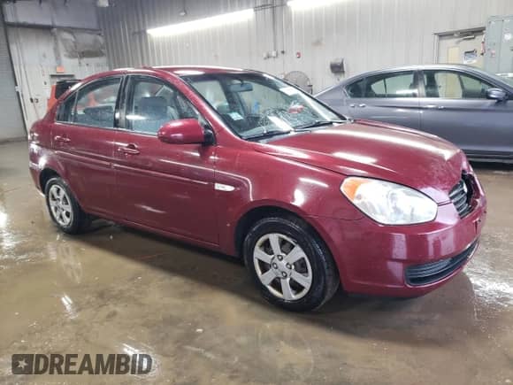 2007 Hyundai Accent GLS z VIN KMHCN46C07U117177, wystawiony jako Copart lot #80696604 z przebiegiem 161 962 mil mil oraz Szkoda całkowita • Salvage title. Historia ofert i sprzedaży dostępna na DreamBid. Obrazek 4.