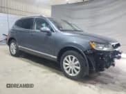 ✅ 2012 Volkswagen Touareg Lux • VIN: WVGEF9BP4CD006475 • Lot: 64091175. Listed on Copart with 179,996 mi. Free auction sales archive from the USA and detailed vehicle history report at DreamBid. Image 4.