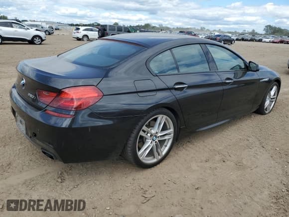 ✅ 2015 BMW 6 Series 650i xDrive • VIN: WBA6B4C51FD761654 • Лот: 70375665. Опубликован ранее на Copart с пробегом 109 919 миль. Бесплатный доступ к архиву аукционных продаж из США и подробный отчёт об истории автомобиля на DreamBid. Изображение 3.
