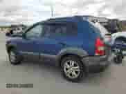 2006 Hyundai Tucson GLS z VIN KM8JN12D96U409834, wystawiony jako Copart lot #77131124 z przebiegiem 234 215 mil mil oraz Szkoda całkowita • Salvage title. Historia ofert i sprzedaży dostępna na DreamBid. Obrazek 2.