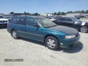 ✅ 1998 Subaru Legacy L • VIN: 4S3BK4354W7300125 • Лот: 61473225. Опубликован ранее на Copart с пробегом 357 253 миль. Бесплатный доступ к архиву аукционных продаж из США и подробный отчёт об истории автомобиля на DreamBid. Изображение 4.