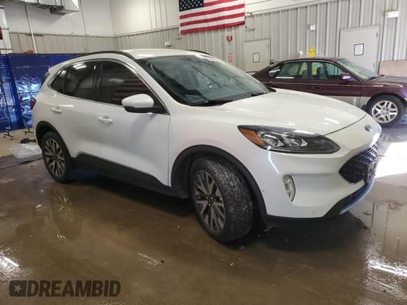 ✅ 2020 Ford Escape Titanium • VIN: 1FMCU9J99LUB15711 • Lot: 86680545. Listed on Copart with 75,531 mi. Free auction sales archive from the USA and detailed vehicle history report at DreamBid. Image 4.