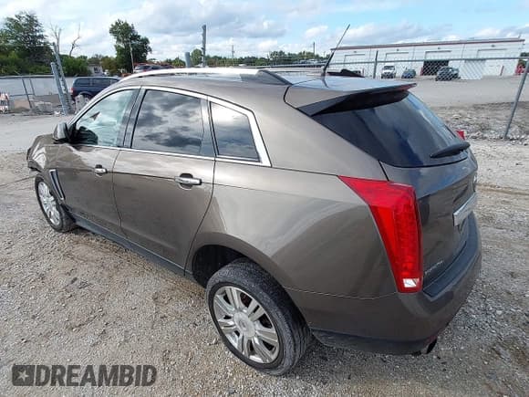 ✅ 2014 Cadillac SRX Luxury Collection • VIN: 3GYFNEE32ES587548 • Lot: 43298731. Listed on IAAI with 126,400 mi. Free auction sales archive from the USA and detailed vehicle history report at DreamBid. Image 3.