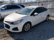 ✅ 2019 Chevrolet Cruze LS • VIN: 1G1BC5SMXK7133347 • Lot: 46763363. Listed on Copart with 100,664 mi. Free auction sales archive from the USA and detailed vehicle history report at DreamBid. Image 1.