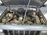 ✅ 1998 Jeep Cherokee Sport • VIN: 1J4FJ67S9WL141068 • Lot: 68575175. Listed on Copart with 138,072 mi. Free auction sales archive from the USA and detailed vehicle history report at DreamBid. Image 12.