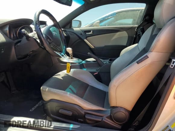 ✅ 2013 Hyundai Genesis Coupe Premium • VIN: KMHHT6KD3DU103811 • Lot: 63233745. Wystawiony na Copart z przebiegiem 231 430 mil. Bezpłatny archiwum sprzedaży aukcyjnych z USA i szczegółowy raport historii pojazdu na DreamBid. Zdjęcie 7.