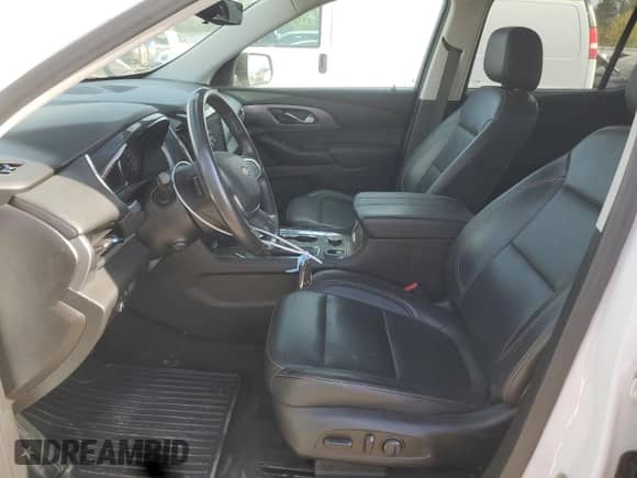 2021 Chevrolet Traverse Premier с VIN 1GNEVKKW0MJ179278, выставлен на аукционе Copart как лот 84952265 с пробегом 76 251 миль миль и Списание • Salvage title. История ставок и продаж доступна на DreamBid. Изображение 7.