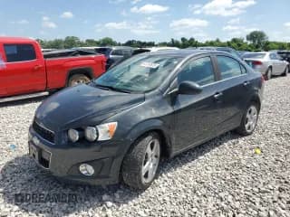 ✅ 2014 Chevrolet Sonic LTZ • VIN: 1G1JE5SHXE4147828 • Lot: 61797675. Listed on Copart with 163,341 mi. Free auction sales archive from the USA and detailed vehicle history report at DreamBid. Image 1.
