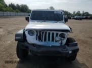 ✅ 2022 Jeep Wrangler Unlimited Sport Altitude • VIN: 1C4HJXDN0NW132386 • Лот: 61382185. Опубликован ранее на Copart с пробегом 65 673 миль. Бесплатный доступ к архиву аукционных продаж из США и подробный отчёт об истории автомобиля на DreamBid. Изображение 5.
