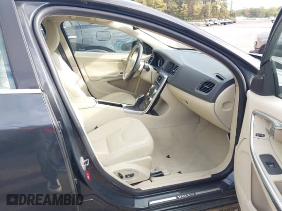 ✅ 2015 Volvo S60 T5 Drive-E Premier • VIN: YV140MFK9F2364118 • Lot: 43454496. Listed on IAAI with 47,012 mi. Free auction sales archive from the USA and detailed vehicle history report at DreamBid. Image 5.