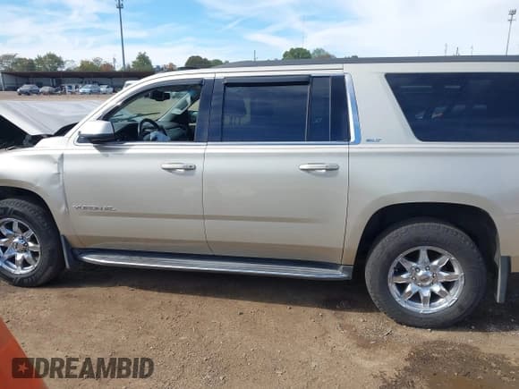 ✅ 2015 GMC Yukon XL SLT • VIN: 1GKS2HKC7FR124669 • Lot: 43467437. Listed on IAAI with 144,058 mi. Free auction sales archive from the USA and detailed vehicle history report at DreamBid. Image 15.