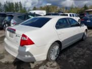 ✅ 2011 Ford Fusion Hybrid • VIN: 3FADP0L37BR246331 • Лот: 43454685. Опубликован ранее на IAAI с пробегом 232 440 миль. Бесплатный доступ к архиву аукционных продаж из США и подробный отчёт об истории автомобиля на DreamBid. Изображение 4.