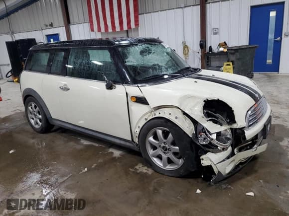 ✅ 2009 MINI Clubman • VIN: WMWML33509TX36429 • Lot: 81014065. Listed on Copart with 116,409 mi. Free auction sales archive from the USA and detailed vehicle history report at DreamBid. Image 4.