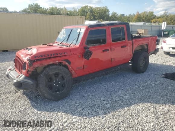 ✅ 2021 Jeep Gladiator Mojave • VIN: 1C6JJTEG5ML574601 • Lot: 71854125. Listed on Copart with 53,992 mi. Free auction sales archive from the USA and detailed vehicle history report at DreamBid. Image 1.