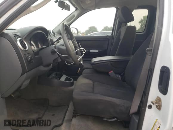 ✅ 2006 Mitsubishi Raider LS • VIN: 1Z7HC22K66S528986 • Lot: 67320235. Wystawiony na Copart z przebiegiem 141 427 mil. Bezpłatny archiwum sprzedaży aukcyjnych z USA i szczegółowy raport historii pojazdu na DreamBid. Zdjęcie 7.