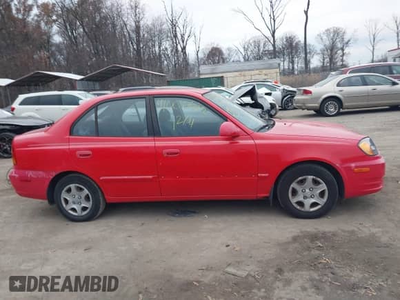2005 Hyundai Accent GLS с VIN KMHCG45CX5U614083, выставлен на аукционе IAAI как лот 41006582 с пробегом 72 516 миль миль и . История ставок и продаж доступна на DreamBid. Изображение 13.