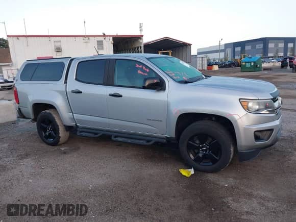 2018 Chevrolet Colorado 2WD LT z VIN 1GCGSCEN2J1229807, wystawiony jako IAAI lot #43391851 z przebiegiem 88 766 mil mil oraz . Historia ofert i sprzedaży dostępna na DreamBid. Obrazek 13.