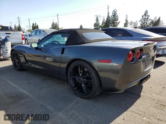 ✅ 2013 Chevrolet Corvette 1LT • VIN: 1G1YE3DW0D5103313 • Lot: 60044914. Listed on Copart with 166,611 mi. Free auction sales archive from the USA and detailed vehicle history report at DreamBid. Image 2.
