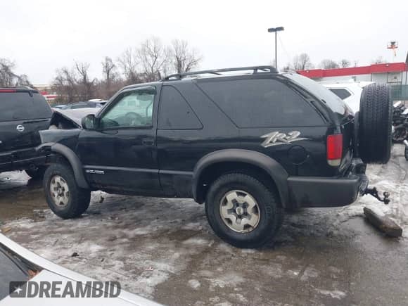 2004 Chevrolet Blazer LS with VIN 1GNCT18X84K107391, listed as a IAAI auction lot 41366867 with 188,821 mi miles and . Bid and sale history available at DreamBid. Image 15.
