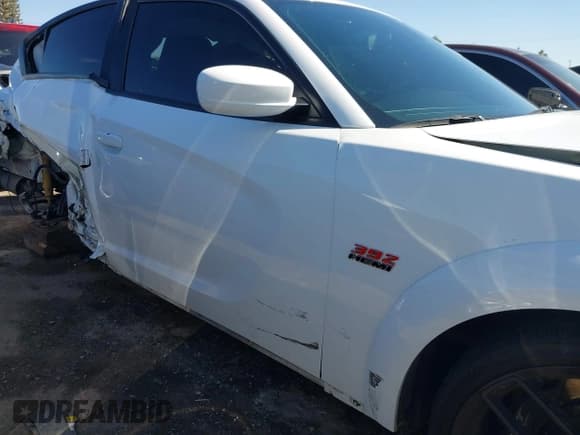 ✅ 2022 Dodge Charger Scat Pack Widebody • VIN: 2C3CDXGJ8NH105126 • Lot: 42305855. Wystawiony na IAAI z przebiegiem 65 639 mil. Bezpłatny archiwum sprzedaży aukcyjnych z USA i szczegółowy raport historii pojazdu na DreamBid. Zdjęcie 18.