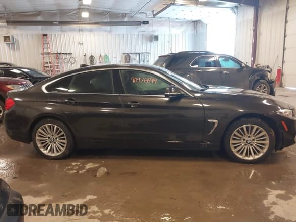 ✅ 2015 BMW 4 Series 435i xDrive • VIN: WBA4B3C54FGV48147 • Lot: 41310255. Listed on IAAI with 93,273 mi. Free auction sales archive from the USA and detailed vehicle history report at DreamBid. Image 13.