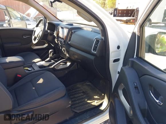 ✅ 2023 Nissan Frontier S • VIN: 1N6ED1CM5PN634140 • Lot: 43645990. Listed on IAAI with 31,135 mi. Free auction sales archive from the USA and detailed vehicle history report at DreamBid. Image 5.