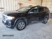 ✅ 2021 GMC Acadia SLT • VIN: 1GKKNULS1MZ205296 • Lot: 82579305. Listed on Copart with 62,592 mi. Free auction sales archive from the USA and detailed vehicle history report at DreamBid. Image 1.