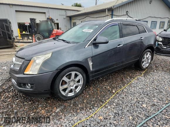 ✅ 2012 Cadillac SRX Performance Collection • VIN: 3GYFNBE30CS598950 • Lot: 81205505. Listed on Copart with 96,413 mi. Free auction sales archive from the USA and detailed vehicle history report at DreamBid. Image 1.
