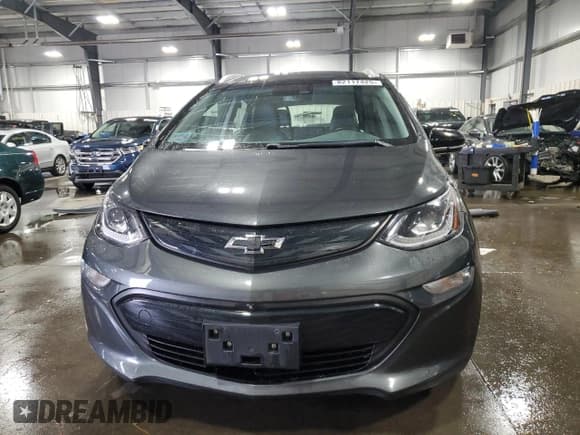 ✅ 2018 Chevrolet Bolt EV Premier • VIN: 1G1FX6S04J4108808 • Lot: 82117425. Listed on Copart with 54,651 mi. Free auction sales archive from the USA and detailed vehicle history report at DreamBid. Image 5.