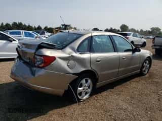 2003 Saturn LS z VIN 1G8JU54F63Y520157, wystawiony jako Copart lot #65477434 z przebiegiem 130 515 mil mil oraz Szkoda całkowita • Salvage title. Historia ofert i sprzedaży dostępna na DreamBid. Obrazek 3.