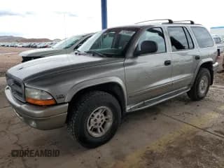 ✅ 1999 Dodge Durango • VIN: 1B4HS28Y8XF627388 • Лот: 71213005. Опубликован ранее на Copart с пробегом 266 293 миль. Бесплатный доступ к архиву аукционных продаж из США и подробный отчёт об истории автомобиля на DreamBid. Изображение 1.
