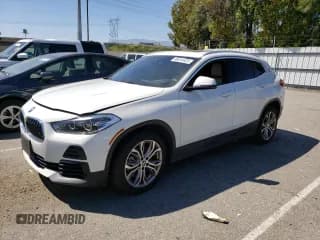 ✅ 2022 BMW X2 sDrive28i • VIN: WBXYH9C07N5T49777 • Лот: 48014423. Опубликован ранее на Copart с пробегом 27 134 миль. Бесплатный доступ к архиву аукционных продаж из США и подробный отчёт об истории автомобиля на DreamBid. Изображение 1.