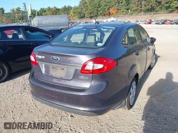 ✅ 2013 Ford Fiesta S • VIN: 3FADP4AJ0DM113631 • Lot: 43217691. Listed on IAAI with 18,113 mi. Free auction sales archive from the USA and detailed vehicle history report at DreamBid. Image 4.