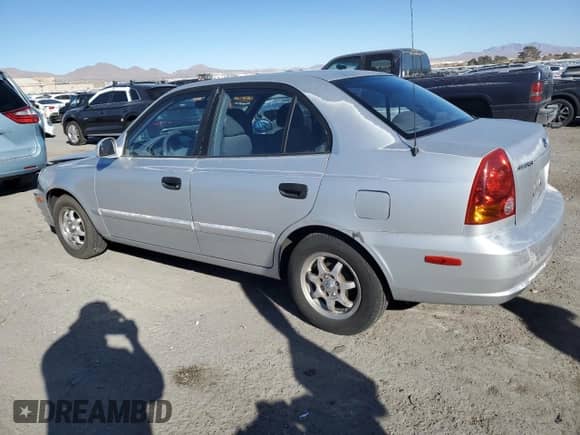 2003 Hyundai Accent GL with VIN KMHCG45C63U413388, listed as a Copart auction lot 88979235 with 240,928 mi miles and Salvage title. Bid and sale history available at DreamBid. Image 2.
