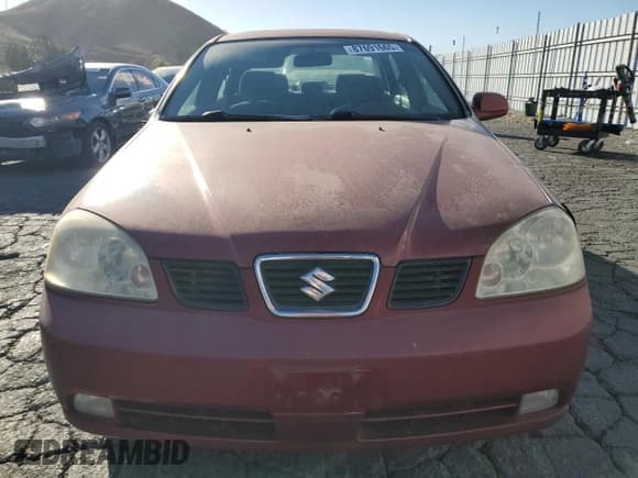✅ 2005 Suzuki Forenza LX • VIN: KL5JJ56Z65K093127 • Lot: 87691665. Wystawiony na Copart z przebiegiem 178 868 mil. Bezpłatny archiwum sprzedaży aukcyjnych z USA i szczegółowy raport historii pojazdu na DreamBid. Zdjęcie 5.