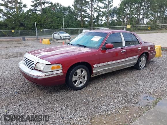 ✅ 2003 Ford Crown Victoria LX • VIN: 2FAHP74W53X157086 • Lot: 43324773. Listed on IAAI with 300,946 mi. Free auction sales archive from the USA and detailed vehicle history report at DreamBid. Image 2.