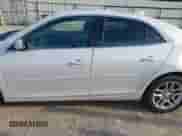 2015 Chevrolet Malibu LT with VIN 1G11C5SL9FF318648, listed as a IAAI auction lot 43322404 with 145,757 mi miles and . Bid and sale history available at DreamBid. Image 14.