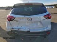 ✅ 2016 Mazda CX-5 Touring • VIN: JM3KE4CY0G0799878 • Lot: 85439335. Wystawiony na Copart z przebiegiem 99 183 mil. Bezpłatny archiwum sprzedaży aukcyjnych z USA i szczegółowy raport historii pojazdu na DreamBid. Zdjęcie 6.